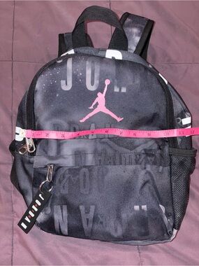 Jordan Mini Black Backpack with Pink Jumpman Accent